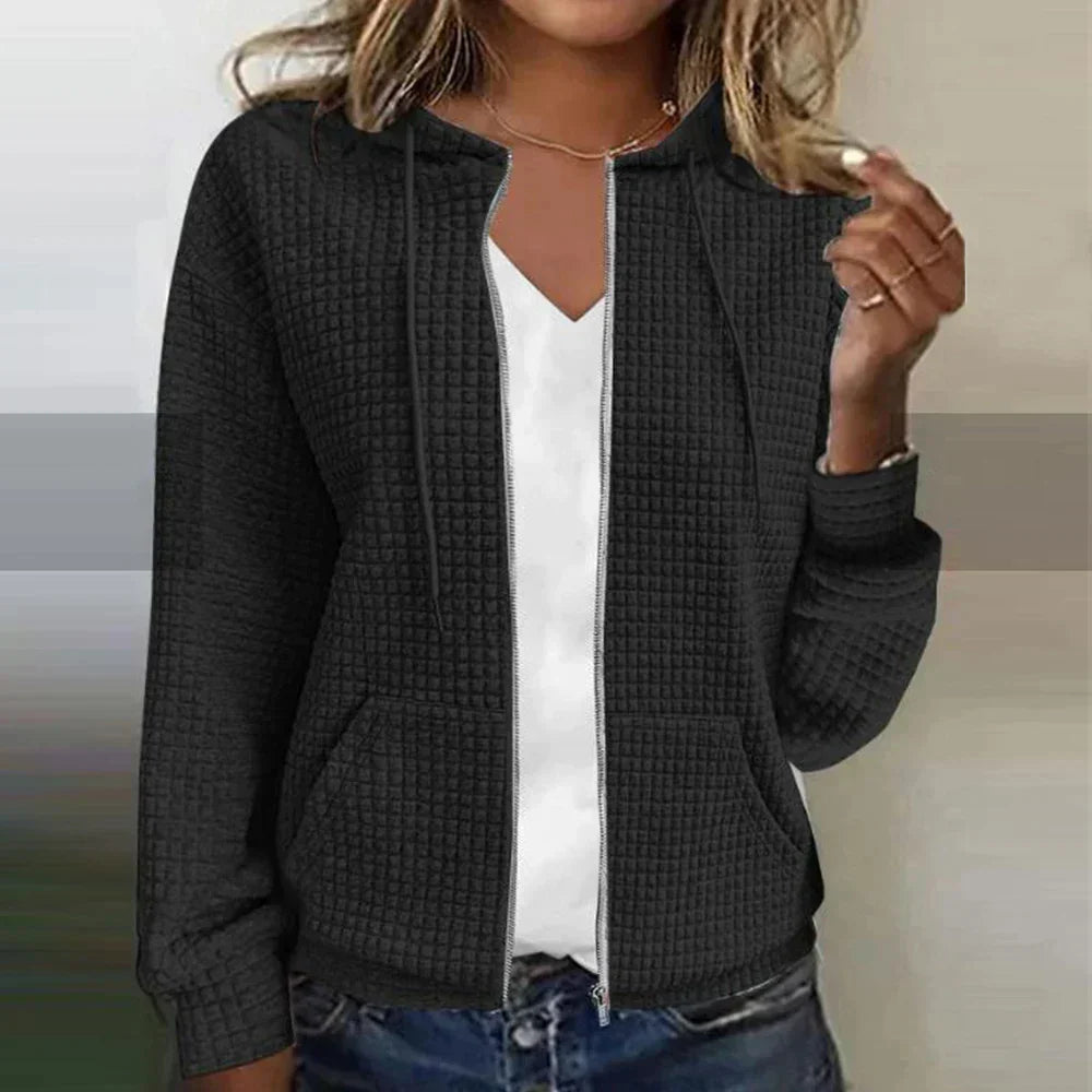 Woman wearing a relaxed fit zip-up comfort jacket, perfect for casual outings & everyday women's fashion.