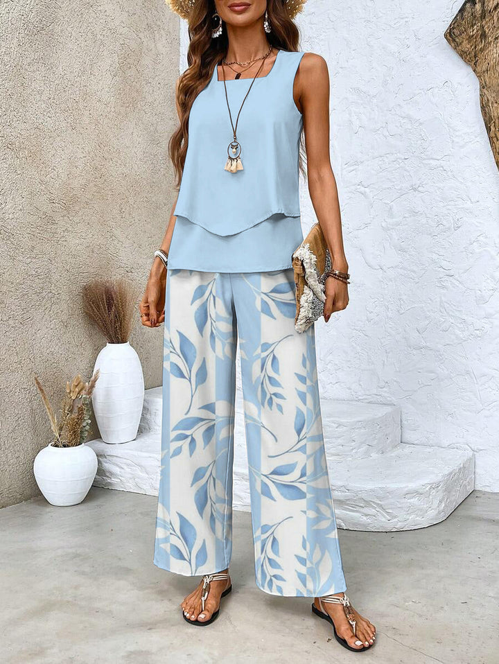 Women's relaxed flowy pants and sleeveless tank top matching set. Comfortable summer loungewear.