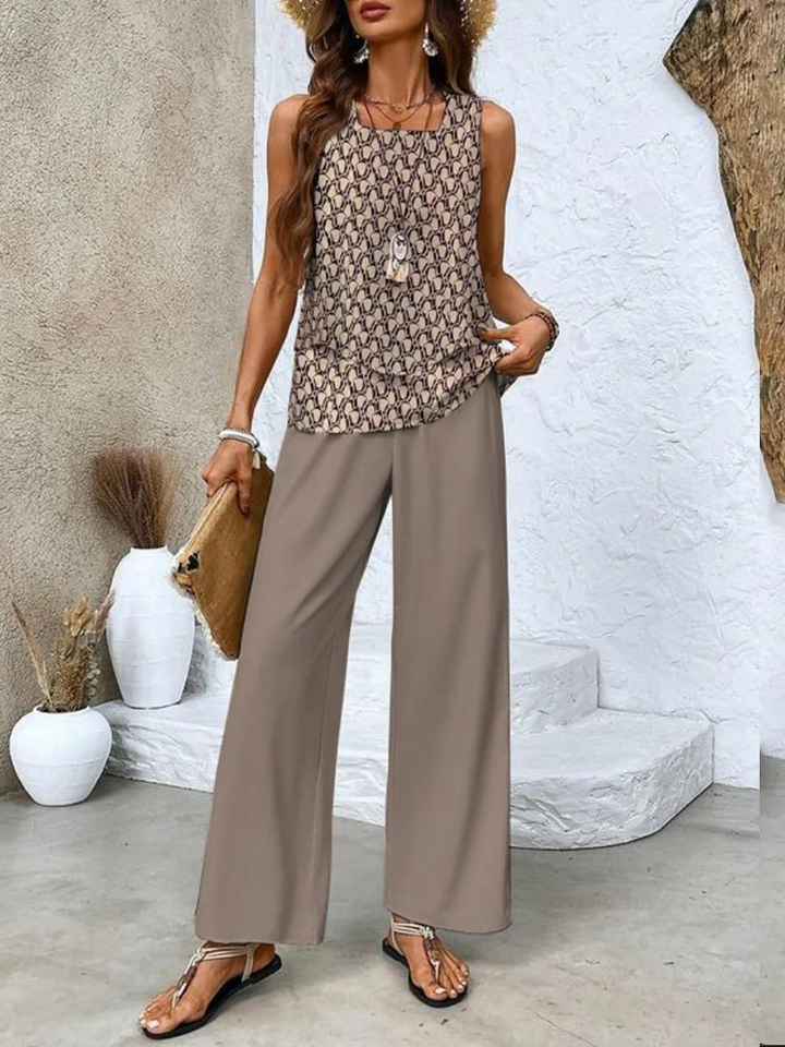Coordinated women's loungewear set with relaxed flowy pants and a sleeveless top. Comfortable two-piece fashion.