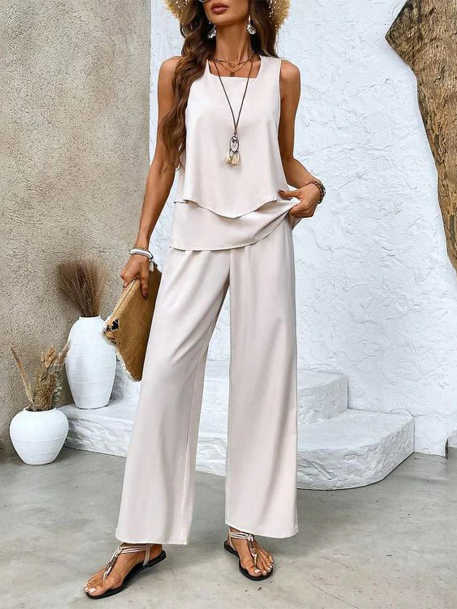 Chic women's casual matching set. Flowy pants & sleeveless top offer ultimate comfort for everyday wear.