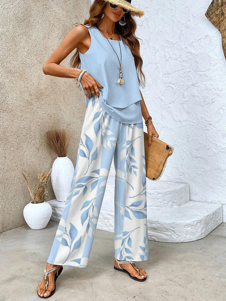 Women's comfortable two-piece set with a relaxed tank top and flowy wide leg pants. Coordinated summer style.