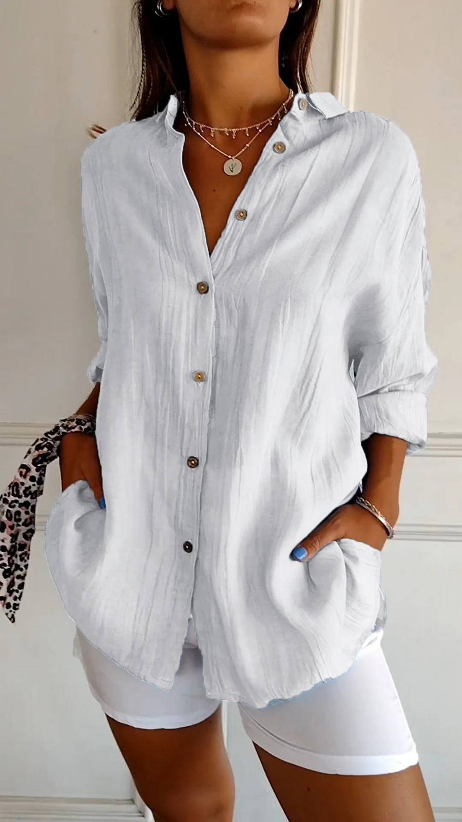 Women's casual oversized long sleeve button-up shirt, relaxed fit, great for weekend outfits.