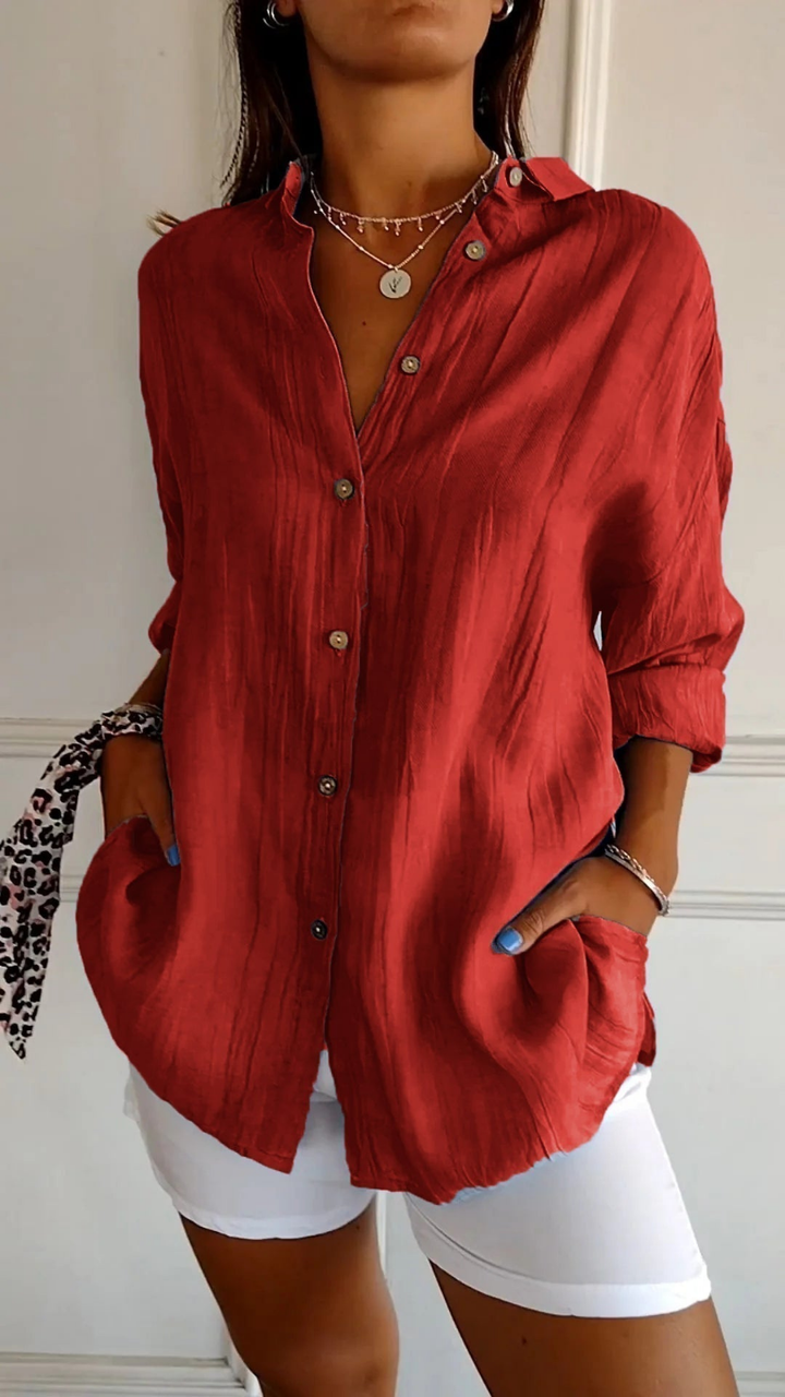Denim blue women's long sleeve oversized button-up shirt, relaxed fit, stylish for casual looks.