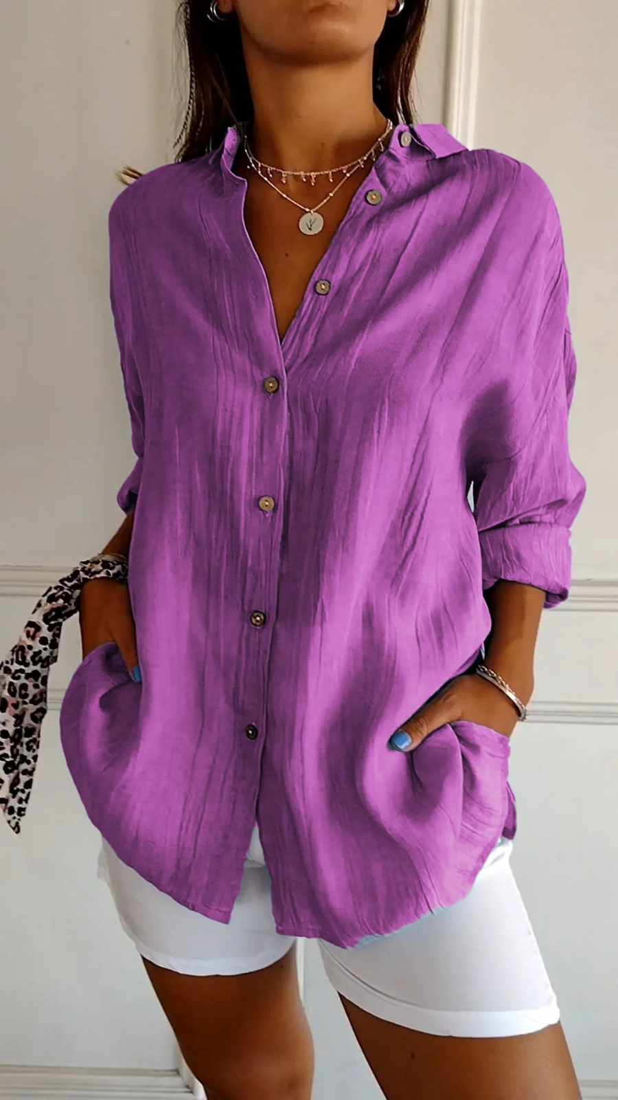 Button-up front, long sleeve women's oversized shirt, relaxed fit, perfect for everyday casual elegance.