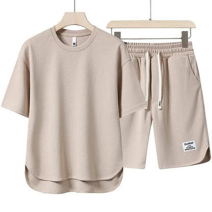Women's casual two-piece T-shirt & shorts set, perfect summer outfit for vacation or warm weather.