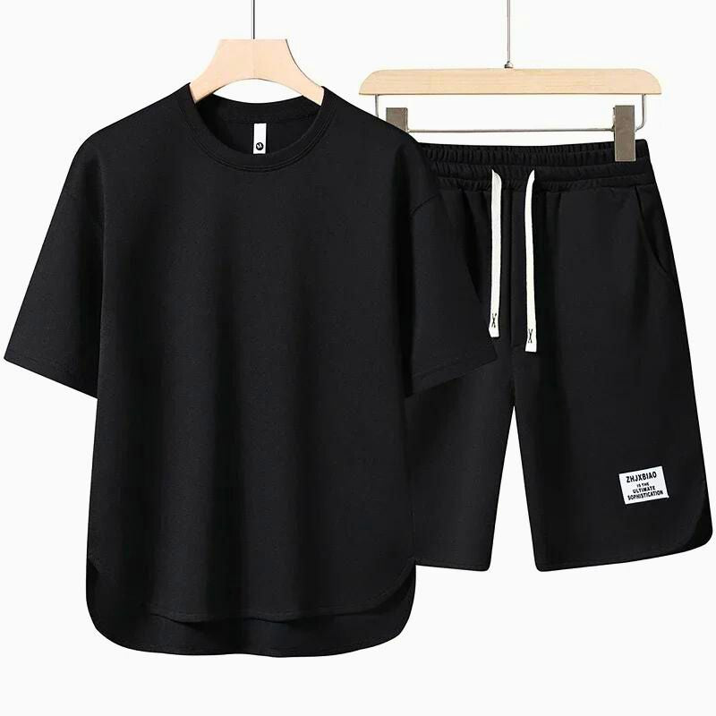 Oversized women's two-piece T-shirt and shorts set; ideal comfortable summer loungewear or vacation outfit.