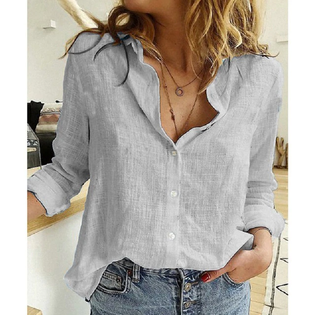 Elegant women's relaxed fit blouse, perfect for workwear or casual chic office style.