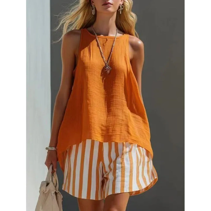 Sleeveless striped tank top and matching shorts. Ideal two-piece set for beach vacations & warm weather.