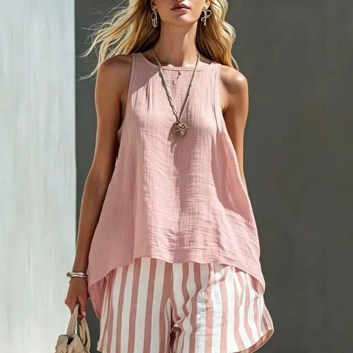 Fashionable women's striped two-piece set. Sleeveless top & striped shorts, great for summer casual wear.