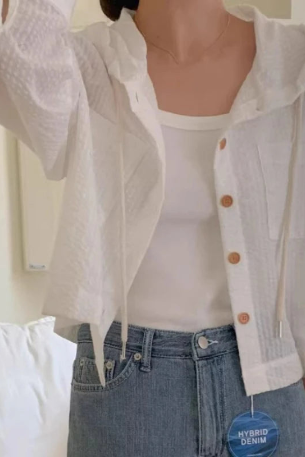 Women's relaxed summer hooded blouse. Effortless long sleeve casual top for comfortable daily wear.