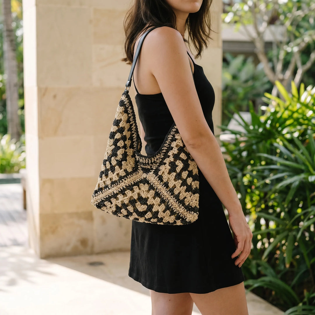 Women's relaxed summer shoulder tote bag, perfect for beach trips or casual everyday style. Lightweight & spacious.