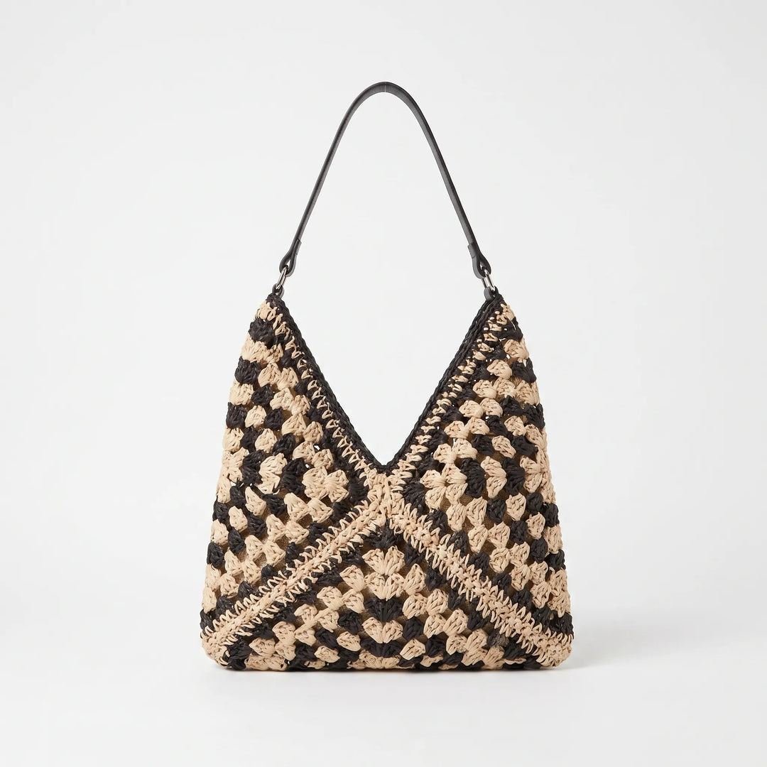 Chic women's patterned summer shoulder tote bag with an open top, ideal for beach, travel, or everyday use.