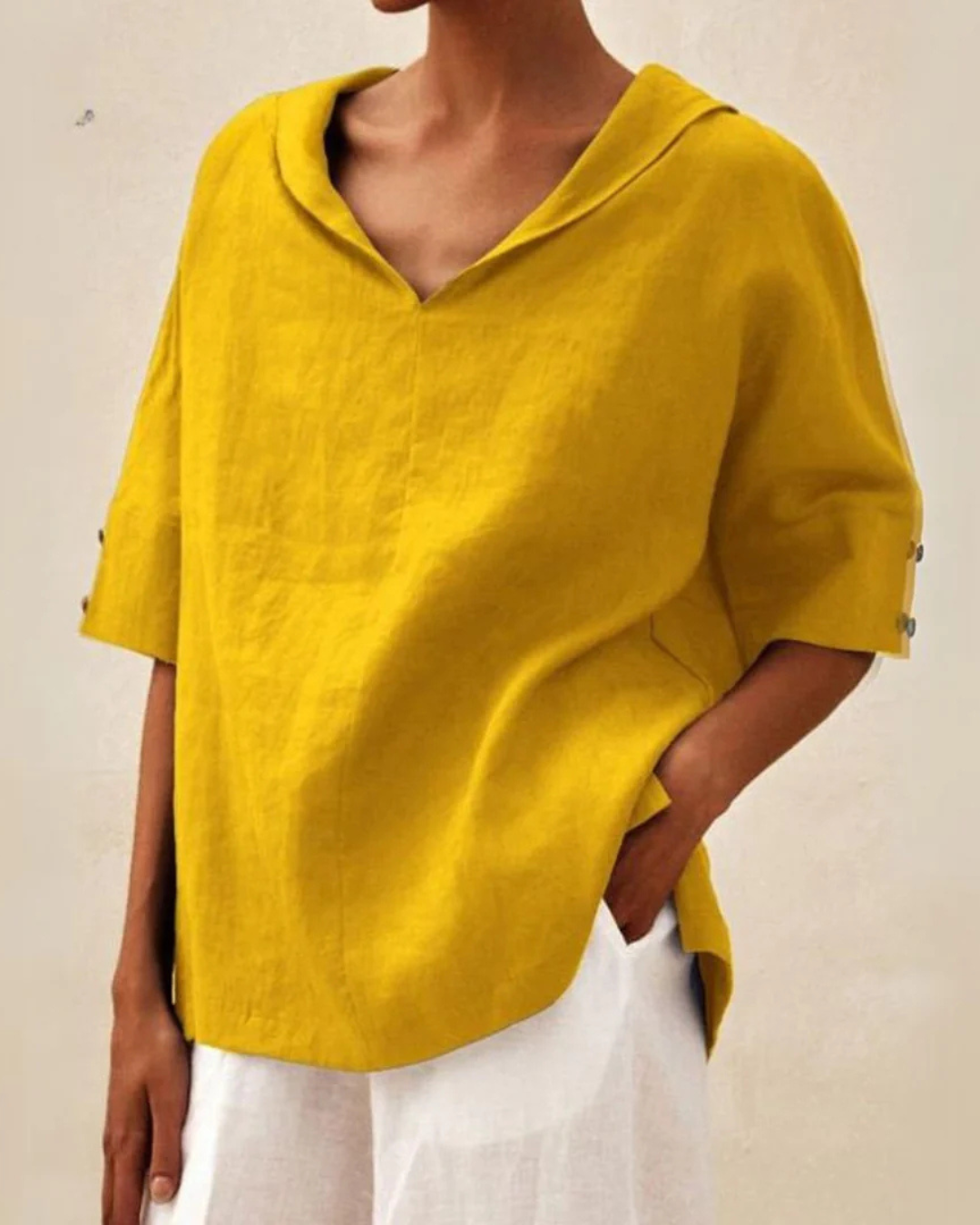 Comfortable women's relaxed fit V-neck blouse with short sleeves, ideal for spring & summer outfits.
