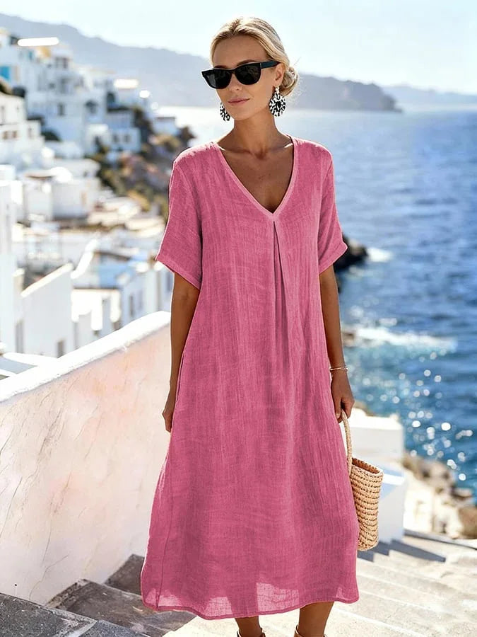 Versatile women's v-neck midi dress, short sleeves, easily styled for casual, everyday, or vacation.