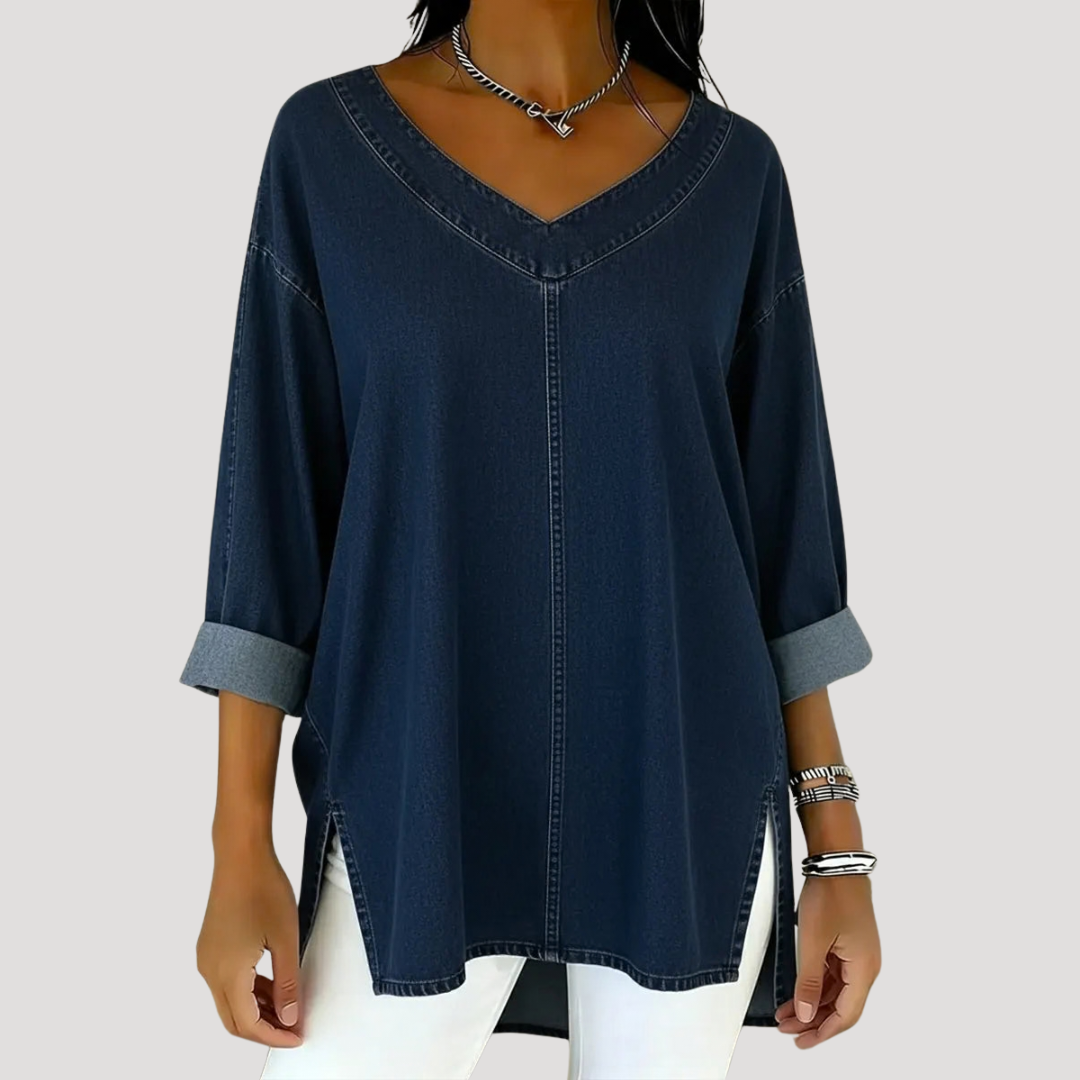 Black longline women's tunic top. Versatile V-neck, elbow sleeve design with side slits for casual wear.