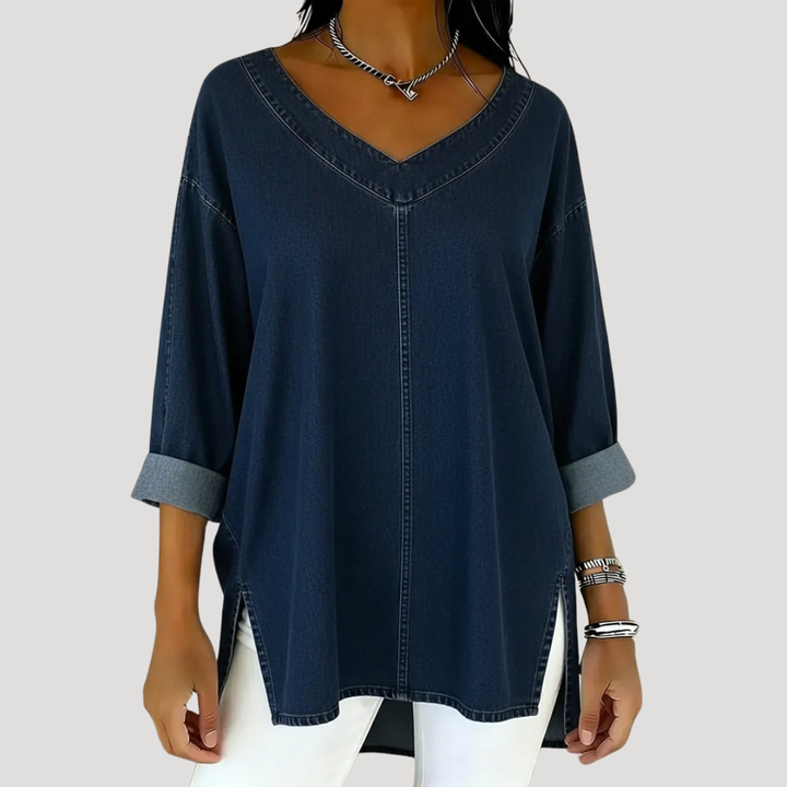 Black longline women's tunic top. Versatile V-neck, elbow sleeve design with side slits for casual wear.