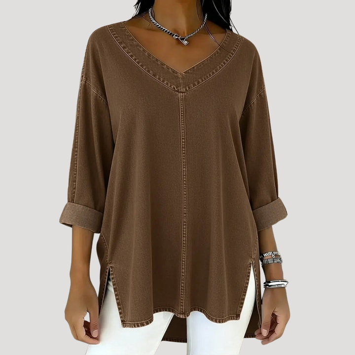 Pink V-neck relaxed tunic top for women, featuring elbow sleeves & side slits. Ideal for everyday casual style.