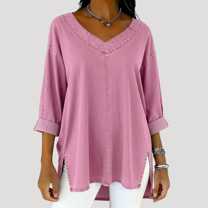 Navy women's casual tunic top with a relaxed fit, V-neck, elbow sleeves & side slits for comfortable wear.
