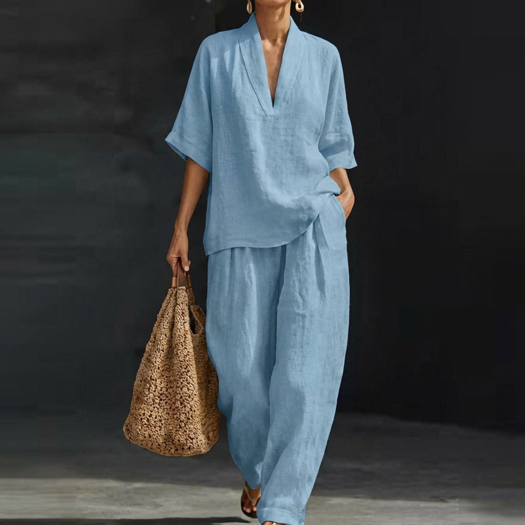 Women's relaxed V-neck two-piece set with wide-leg pants, perfect for comfortable, casual chic wear.