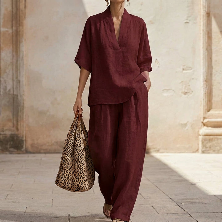 Coordinated women's V-neck top and wide-leg pants set, ideal for versatile everyday fashion.