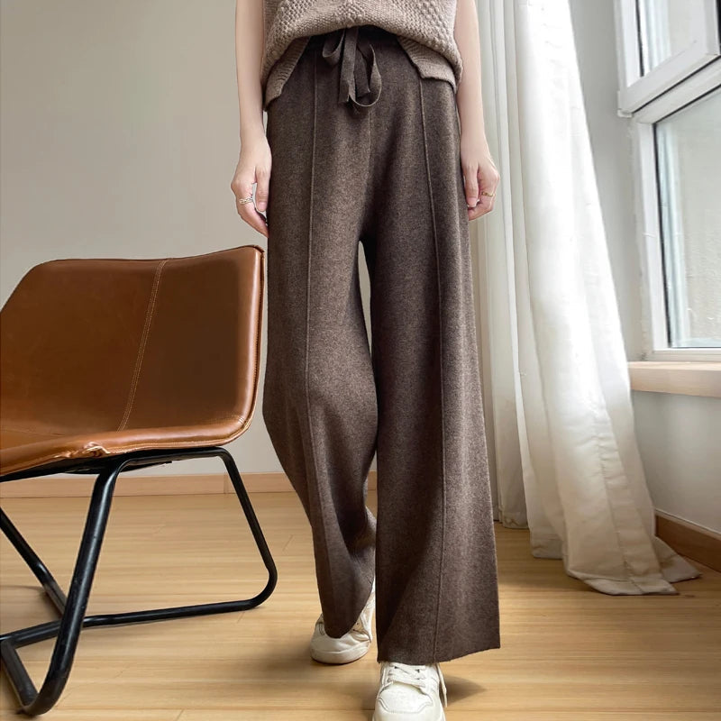 Women's relaxed wide-leg high-waist trousers, offering ultimate comfort for casual everyday wear & style.