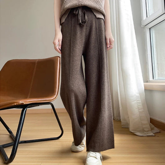 Women's relaxed wide-leg high-waist trousers, offering ultimate comfort for casual everyday wear & style.