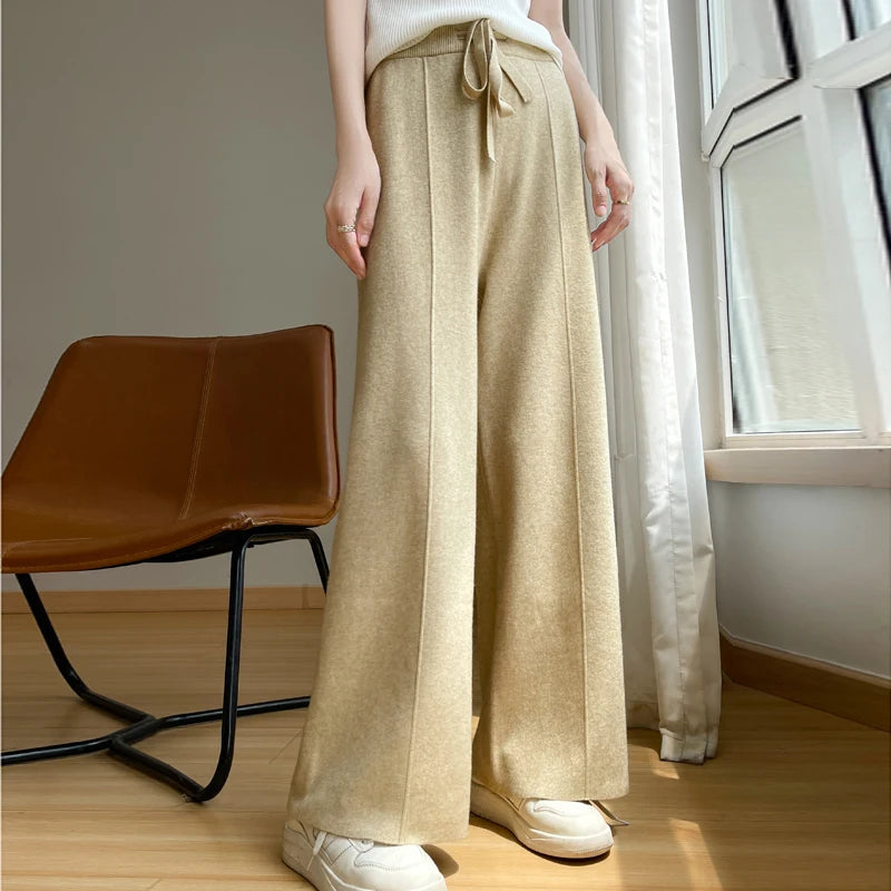 Comfortable women's wide-leg pants with a relaxed fit & high waist, ideal for casual fashion & loungewear.