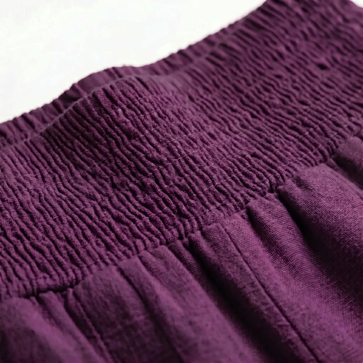 Comfortable women's solid color wide-leg pants for relaxed summer day wear or vacation.