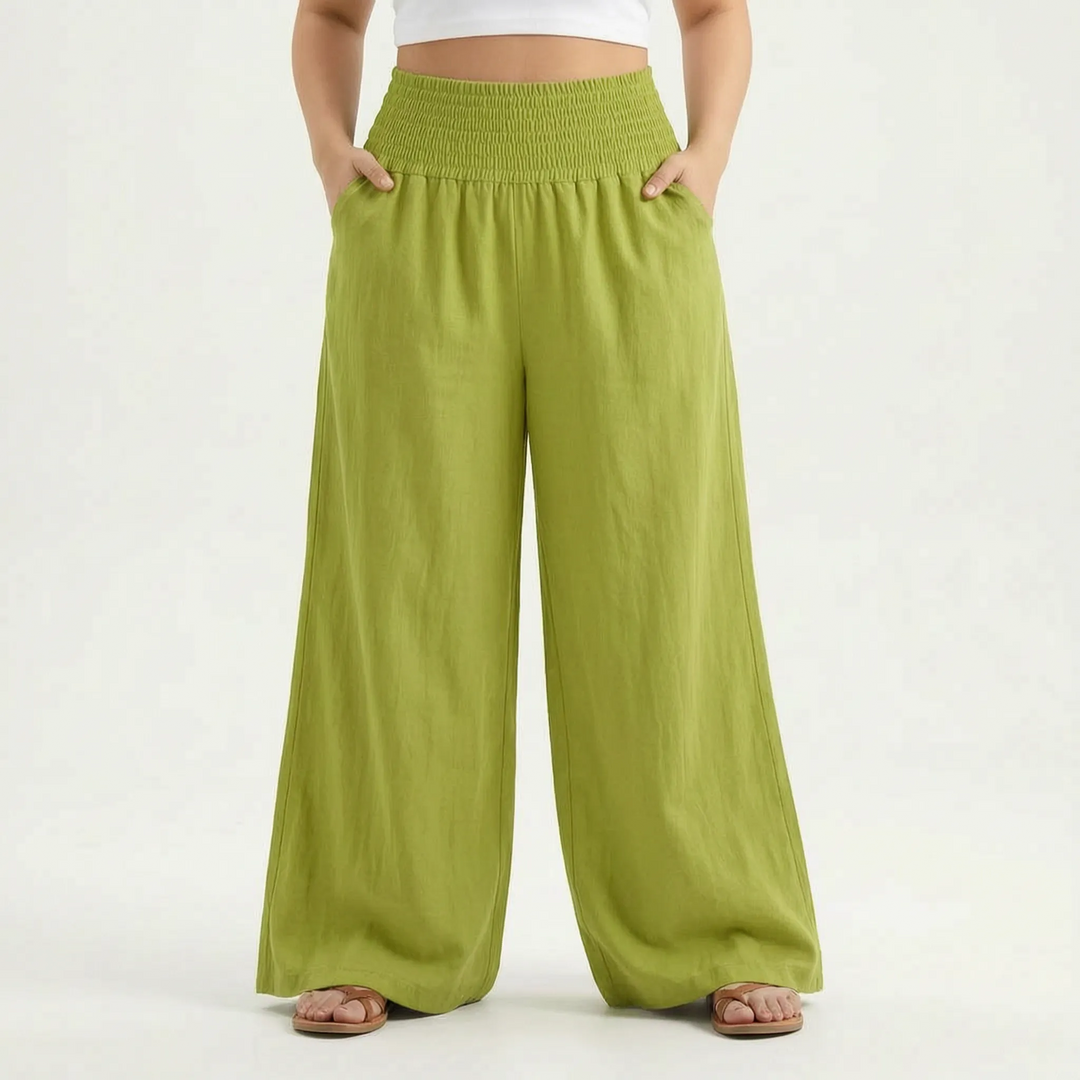 Women's flowy wide-leg summer trousers with elastic waist, designed for ultimate comfort.