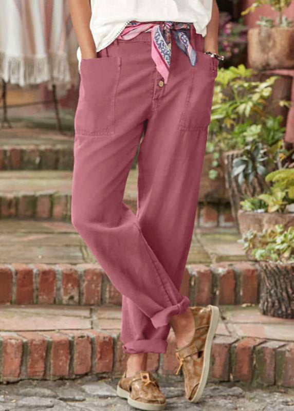 Model showcasing women's relaxed wide leg trousers, effortless style & comfortable fit.