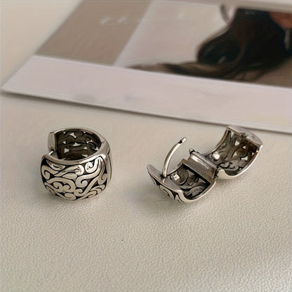 Unique Relic sterling silver earrings for women, intricately engraved. Oxidized vintage style.
