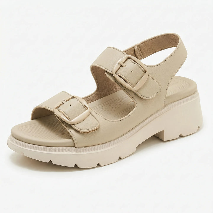 Chunky platform wedge sandals for women. Versatile and comfortable casual footwear with an open-toe design.