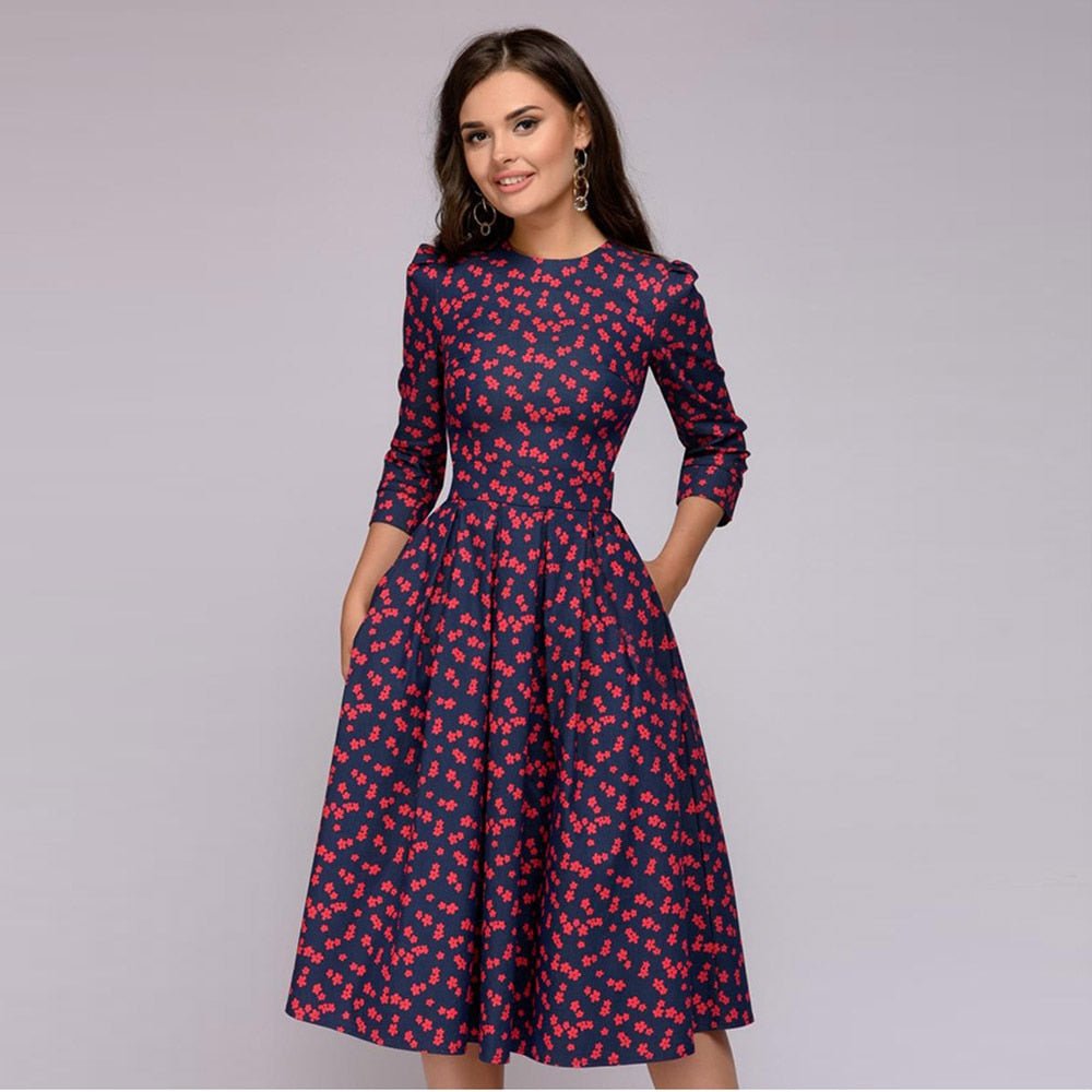Women's A-line midi dress with flattering silhouette, 3/4 sleeves, charming retro floral print.