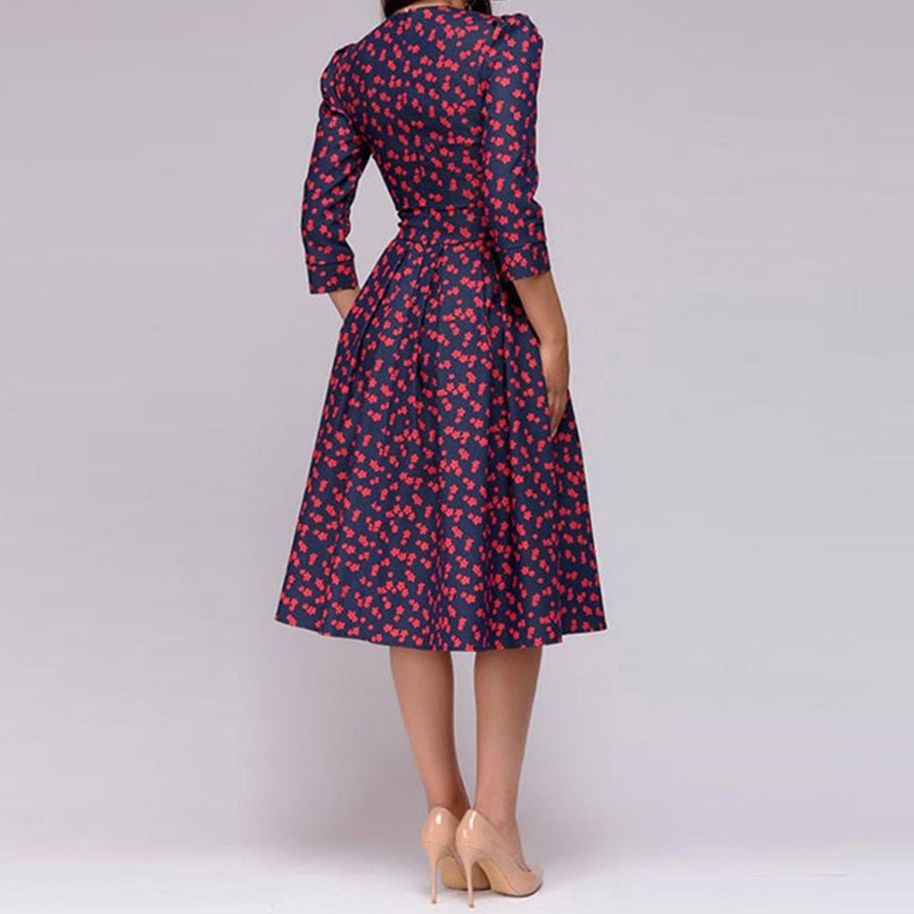 Vintage-inspired women's A-line midi dress, 3/4 sleeves, chic and elegant for a sophisticated look.