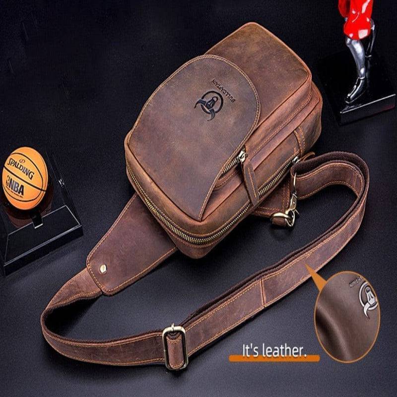Women's retro brown leather crossbody shoulder bag with brass hardware, front view