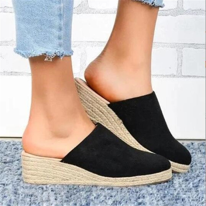 Comfortable women's wedge sandals with retro style, great for casual wear.