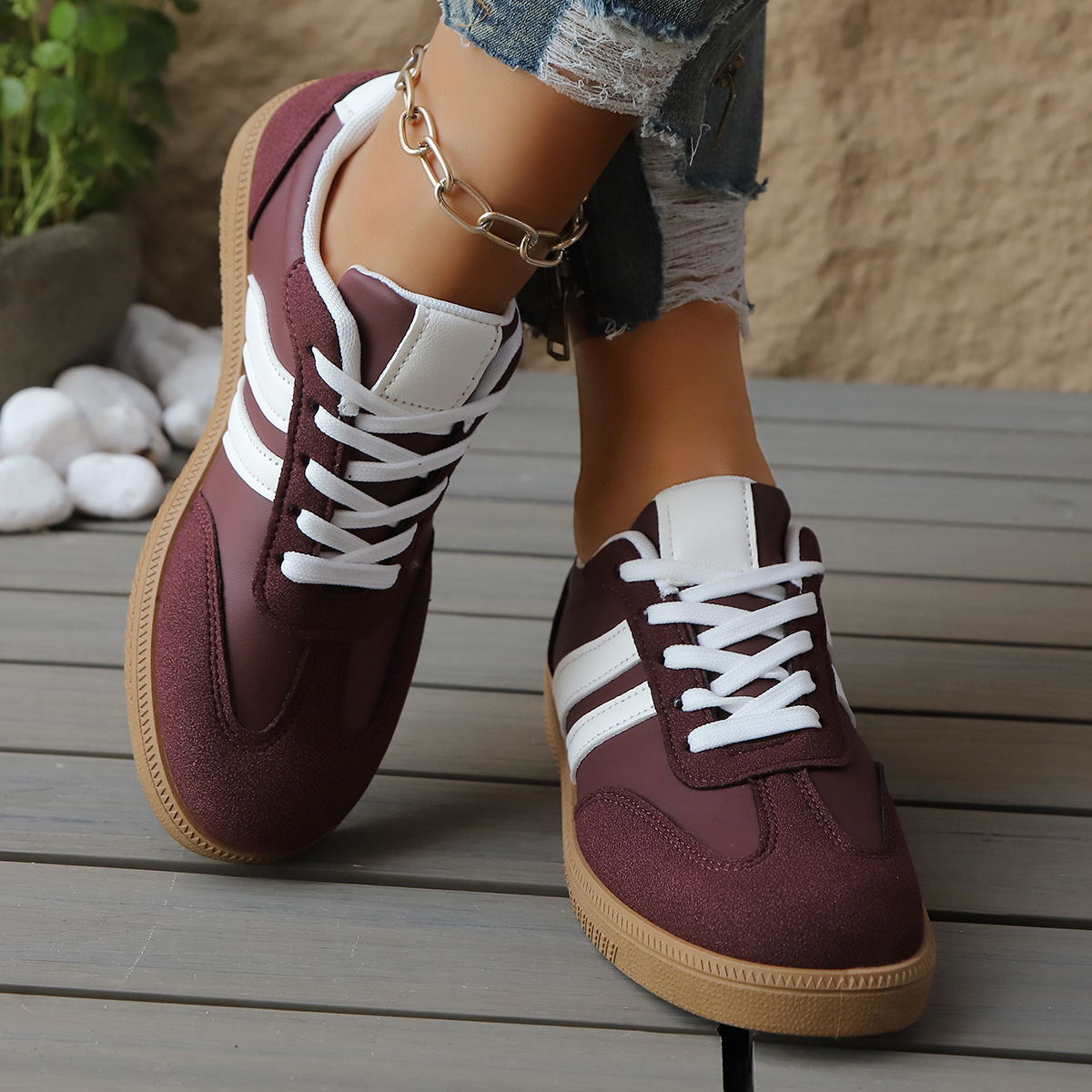 Top view of women's vintage-style comfort sneakers. Retro casual footwear for versatile styling.