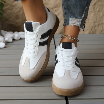 Stylish women's retro comfort sneakers. Vintage-inspired footwear for casual and everyday fashion.
