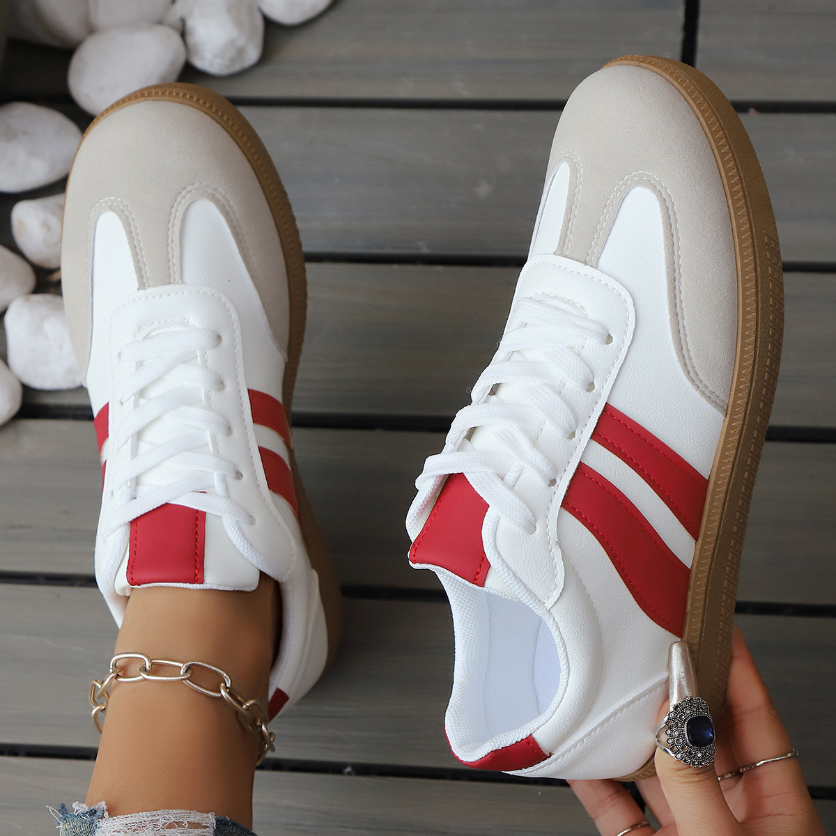 Stylish women's retro comfort sneakers, vintage design. Classic athletic footwear for casual streetstyle.