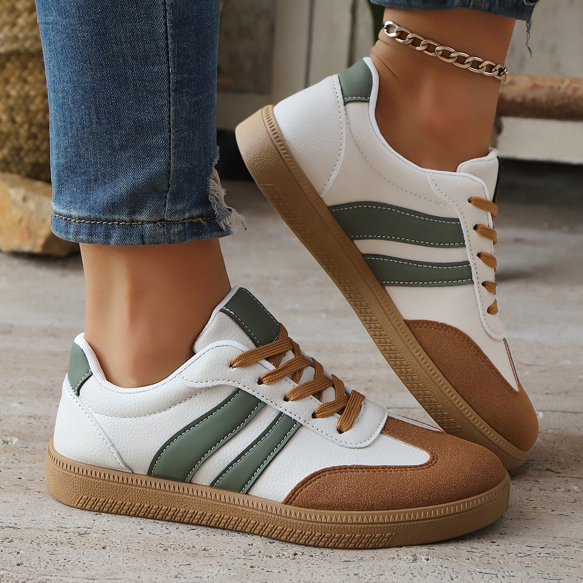 Side view of women's retro comfort sneakers. Vintage athletic footwear for casual everyday style.
