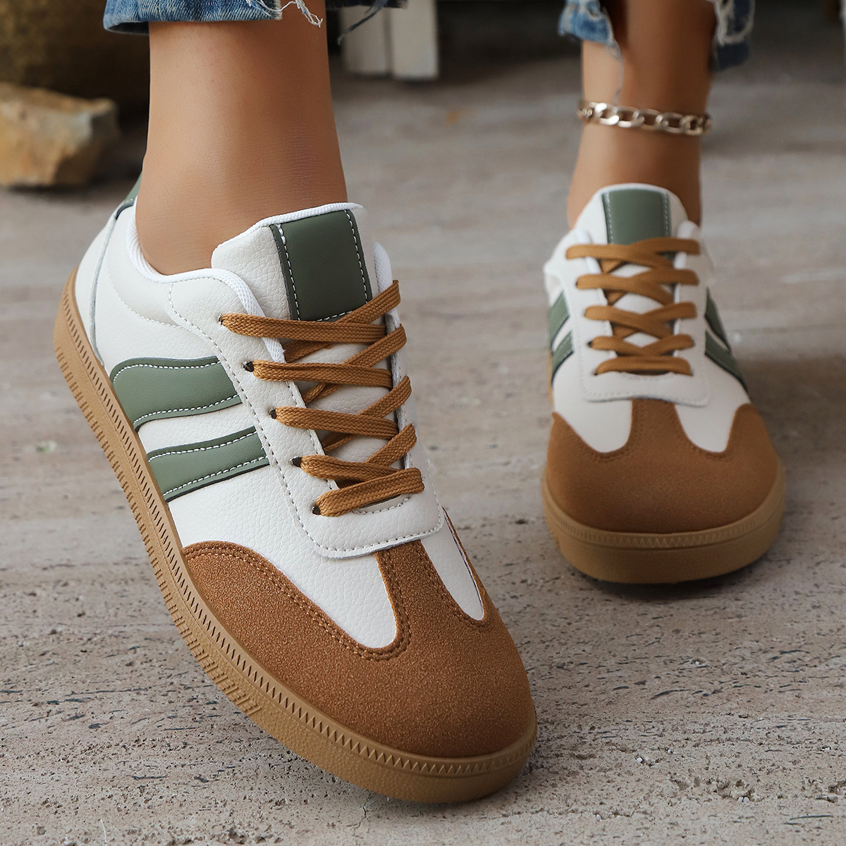 Close-up of women's vintage-style sneakers. Retro comfort footwear with classic detailing.