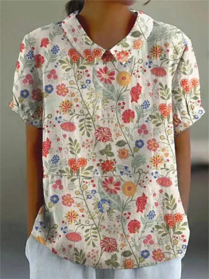 Casual chic women's short sleeve floral top, embroidered retro design, perfect for spring outfits.