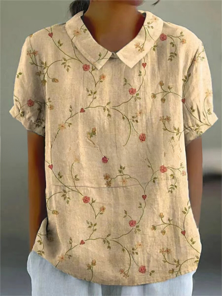 Elegant women's short sleeve floral top with retro embroidery, ideal for spring fashion.