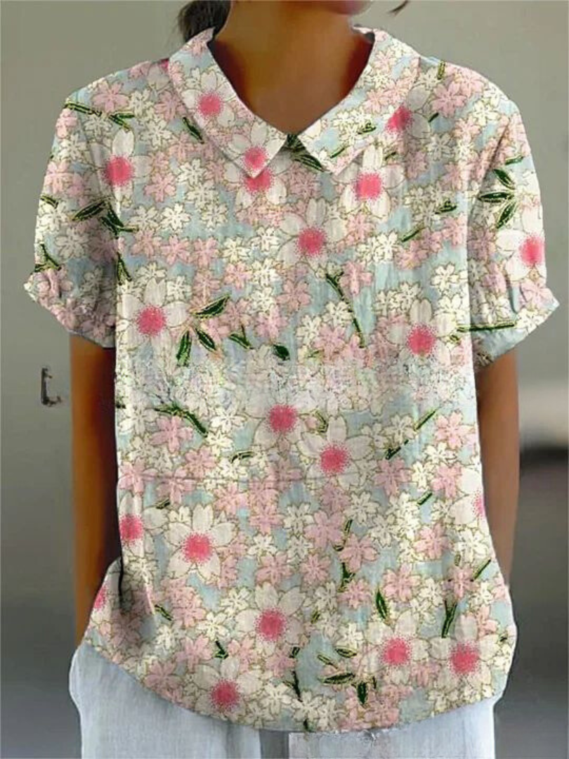 Embroidered women's collared blouse, short sleeves, retro floral design for elegant wear.