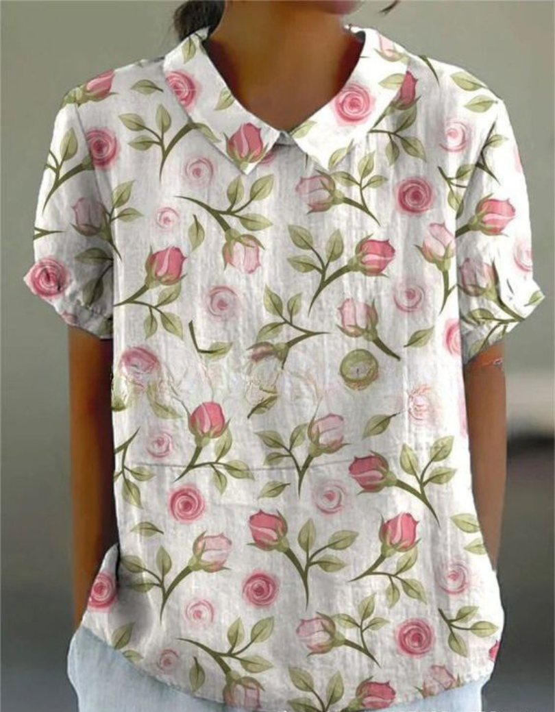 Women's summer blouse, short sleeve, beautiful floral embroidery and a relaxed fit.