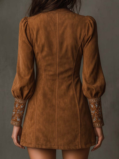Sophisticated retro mini dress for women, featuring intricate embroidery & stylish V-neck. A chic party outfit.