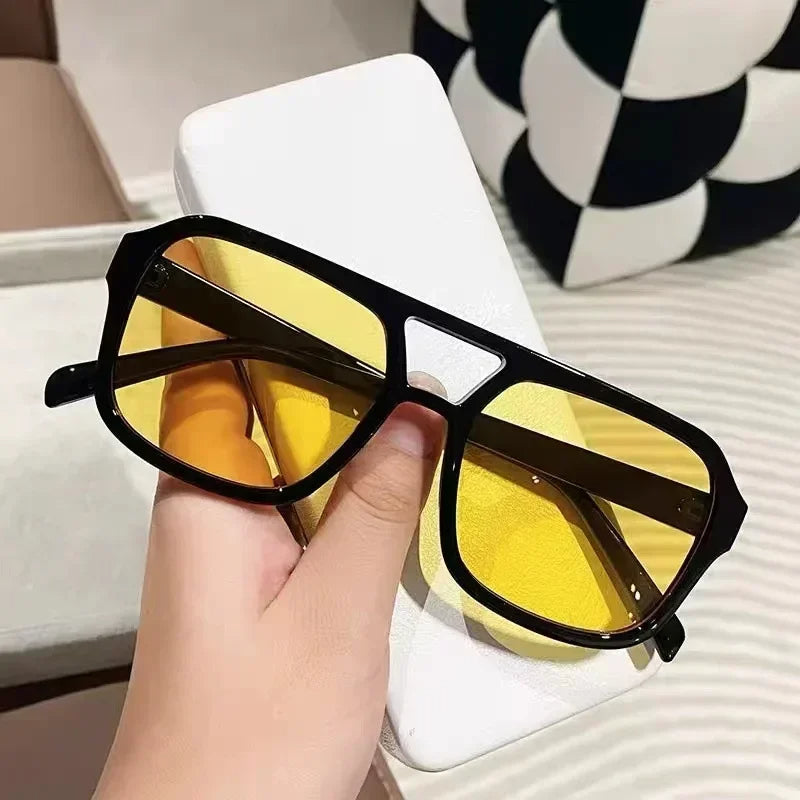 Elegant women's retro square sunglasses, prism effect lenses, offering UV protection.
