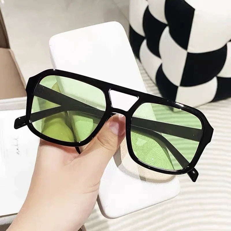Chic women's retro square prism sunglasses, essential UV protection for sunny days.