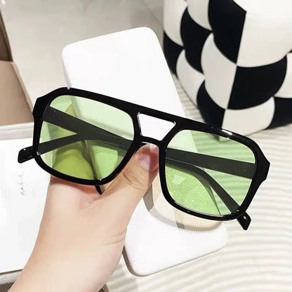Chic women's retro square prism sunglasses, essential UV protection for sunny days.