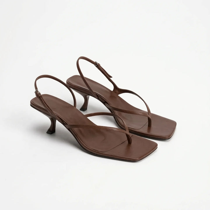 Stylish women's square toe sandals featuring a comfortable low kitten heel & retro slingback.